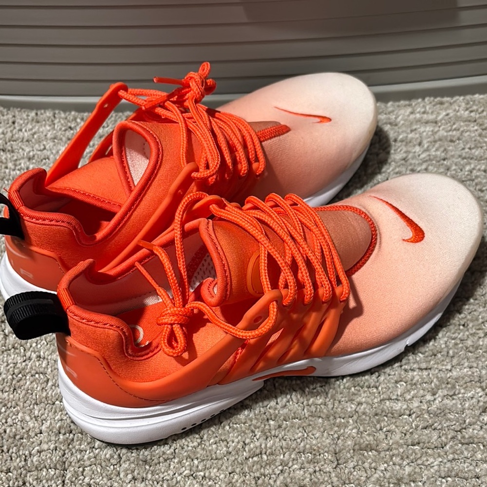 Nike Orange and White High-Top Sneakers with Sporty Design